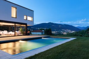 a pool in front of a house